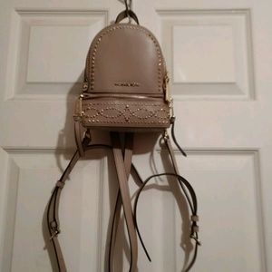 Pink Michael Kors extra small back pack